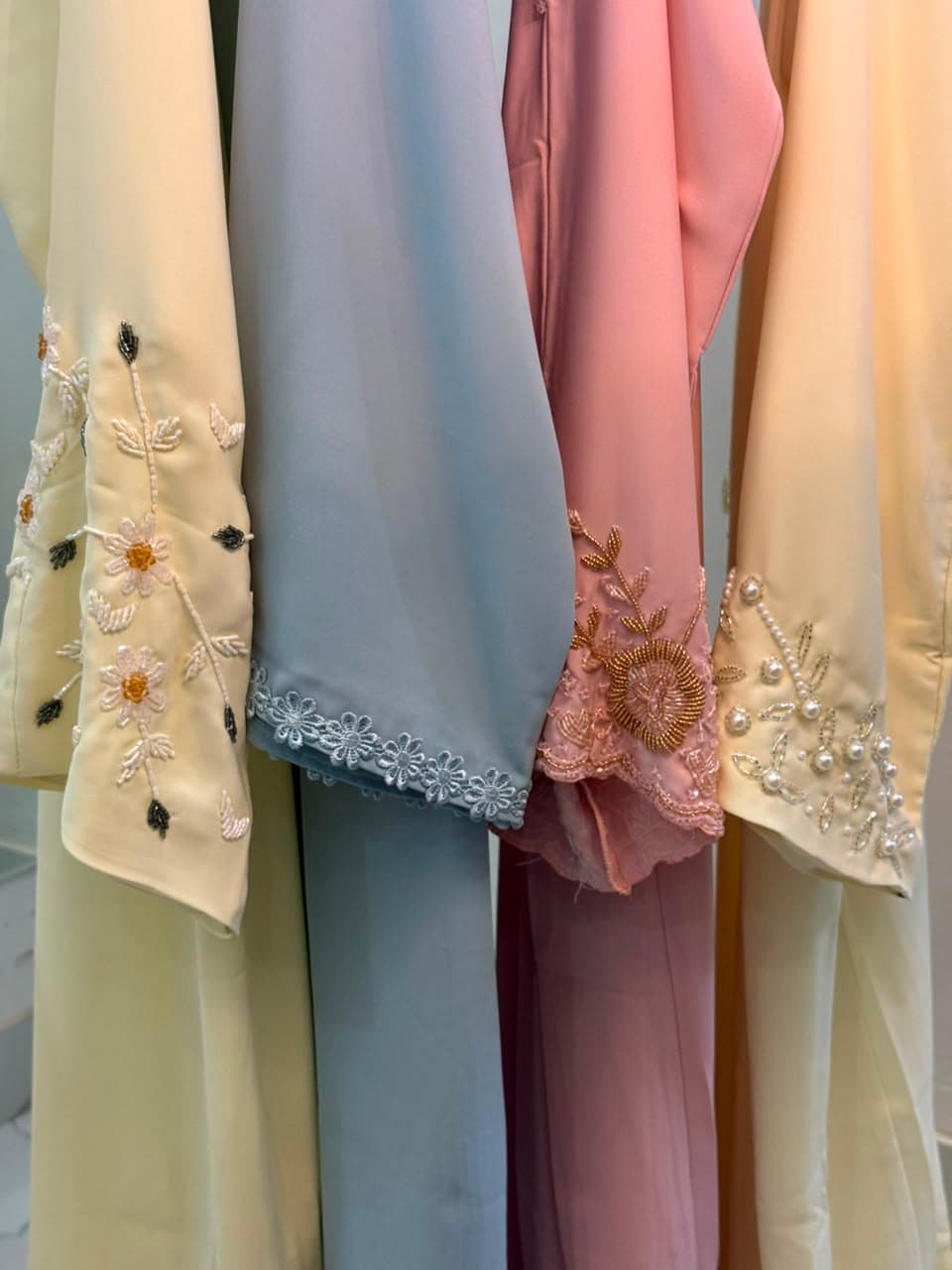 HOOR abaya cuff details — flowers and pearls